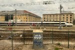 A single deck TGV sits in the yard outside of Marseille Saint-Charles